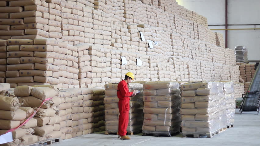 Worker controls of sugar bags in Warehouse