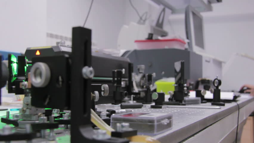 Experiments with a laser system in the laboratory
