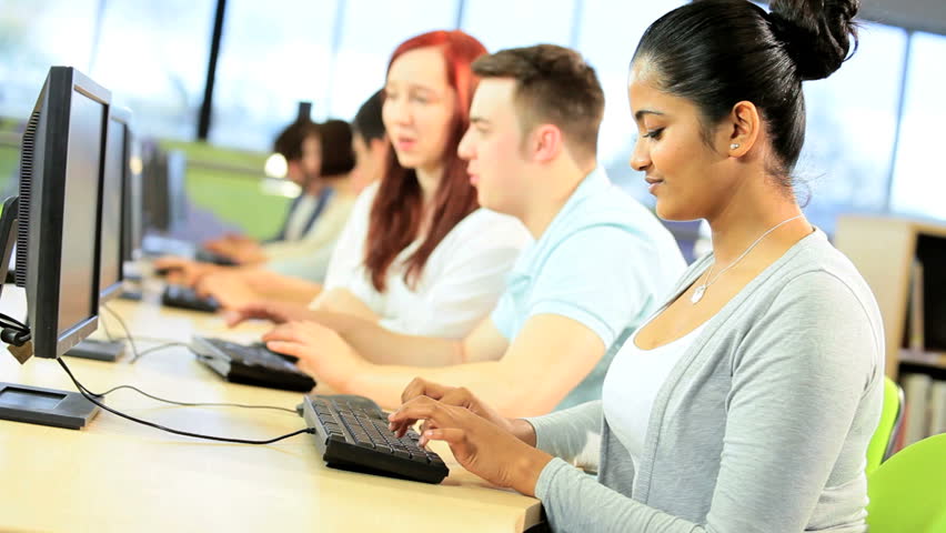 Portrait of Indian female student e-learning with classmates online education system