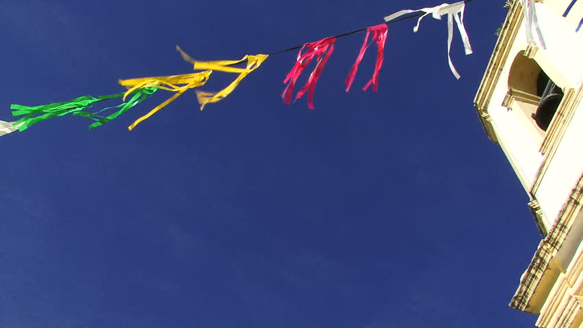 ARACAJU, BRAZIL - MARCH 2008: shot of streamers and rooftops on a clear day.