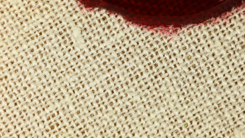 Fabric absorbs Ink paint. Macro.