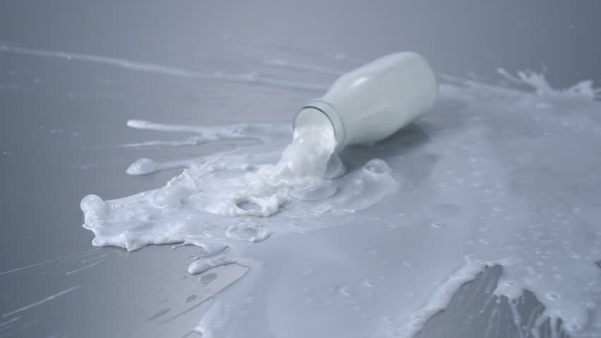 Dropping milk bottle shooting with high speed camera.