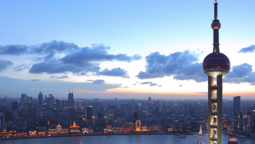 SHANGHAI, CHINA - CIRCA JULY 2012: Panning time lapse of Shanghai skyline from day to night circa July 2012.