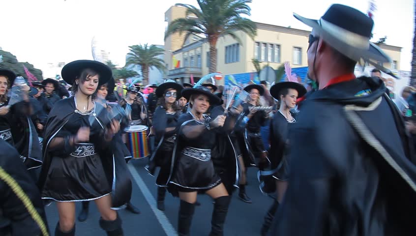 LAS PALMAS DE GRAN CANARIA, SPAIN - FEBRUARY 18: 200,000 masked revelers and a hundred or so festooned cars and floats in the Grande Parade (Gran Cabalgata ) of the Carnival February 18, 2012, Spain 