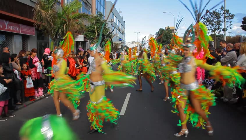 LAS PALMAS DE GRAN CANARIA, SPAIN - FEBRUARY 18: 200,000 masked revelers and a hundred or so festooned cars and floats in the Grande Parade (Gran Cabalgata ) of the Carnival February 18, 2012, Spain 
