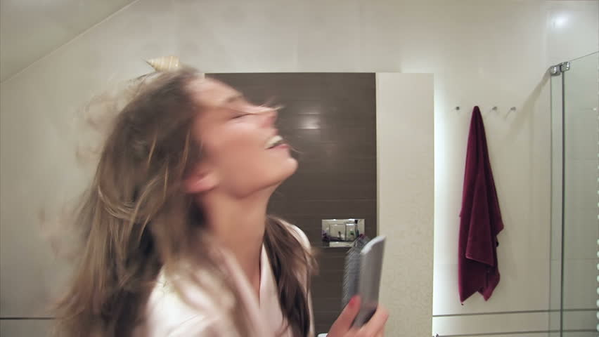woman sings bathroom song