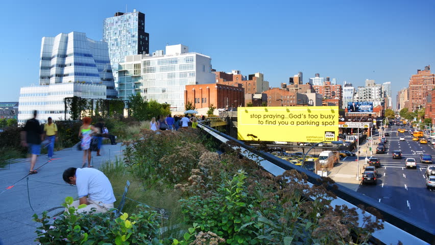 NEW YORK CITY - SEPTEMBER 13: Pedestrians enjoy the High Line on September 13, 2012 in New York, NY. The innovative linear park was opened in 2009 and is built on an elevated railway dating from 1934.