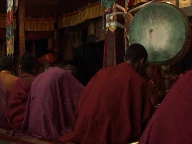 Drummer monk in the buddhist monastery in Ladakh