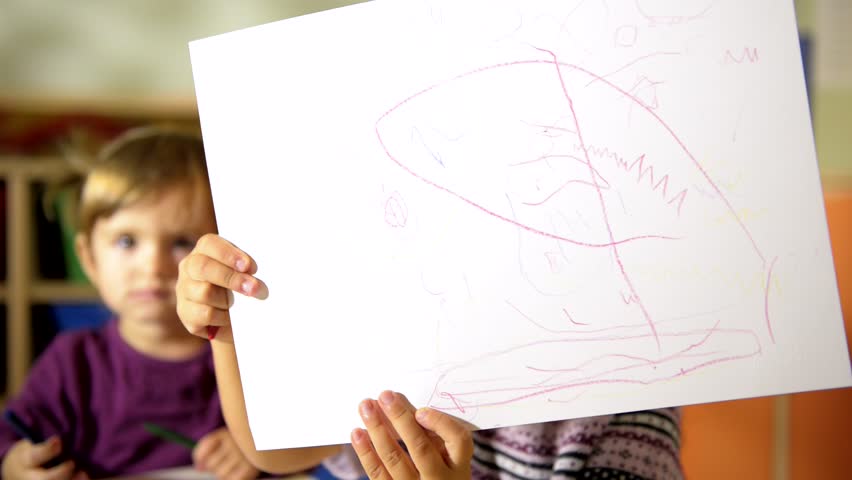 School children, two happy little girls drawing with colors and crayons in kindergarten. Sequence