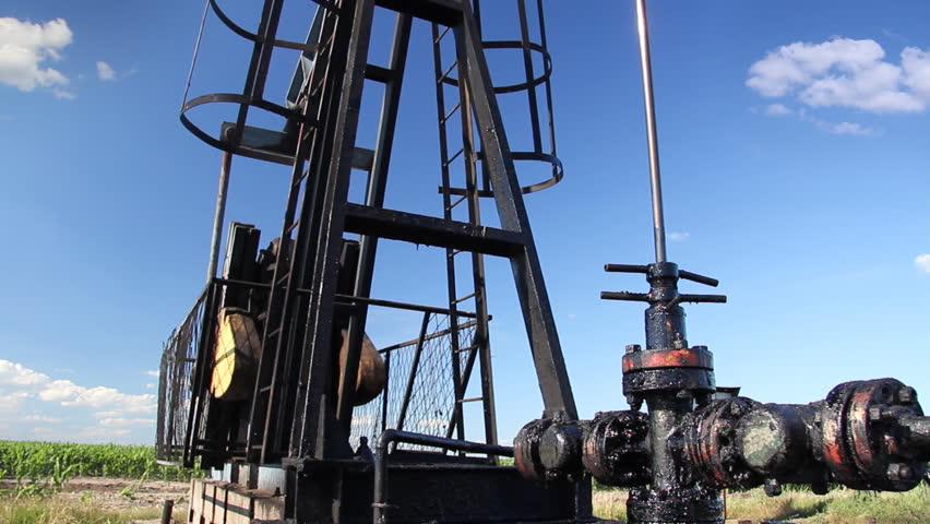 Oil Pump Jack in a Field