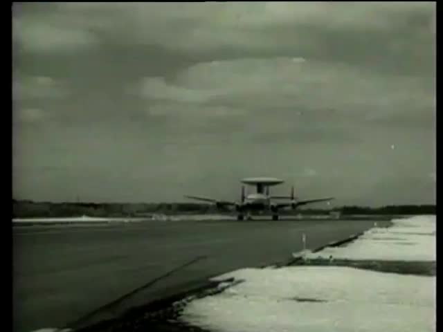 Airplane with a new distance detection radar antenna disc takes off from runway Massachusetts circa 1958-MGM PICTURES, UNIVERSAL-INTERNATIONAL NEWSREEL, USA, filmed in 1958