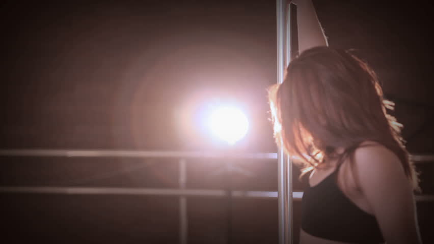 Beautiful woman dancing in strip club