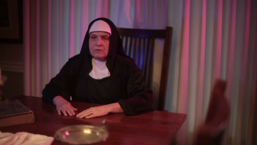 nun waiting inside the church