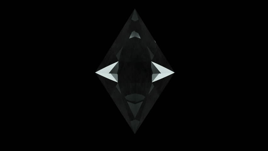 A clear and diamond-like prism rotates on itself in front of a black background. Loops perfectly. Computer generated images.