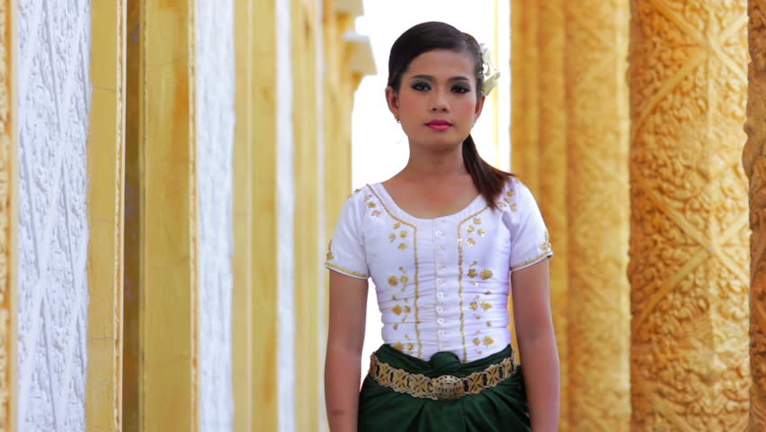 A view of a Beautiful Asian Girl performs Cambodian folk dance in temple