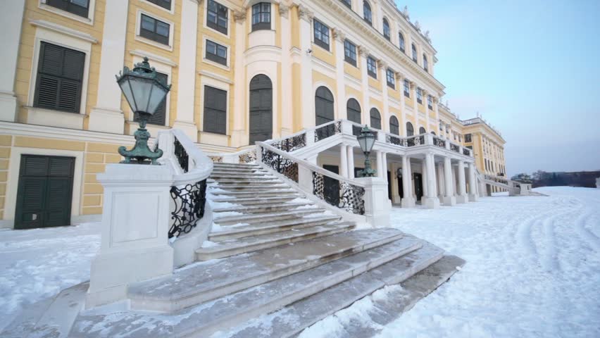 Staircase and lantern of Schonbrunn Palace, shown in motion at winter day in Vienna, Austria