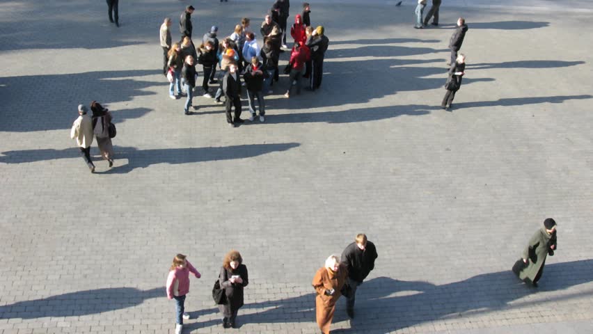 People walking on street. Filtered. View from up. Time lapse. 