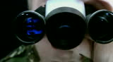 The soldier studies as to work with the device for night vision