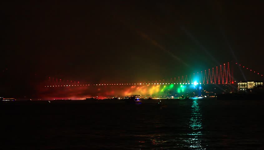 Colorful light beams over Bosporus Bridge on October, 29 Festival Day in Istanbul, Turkey. Bosphorus Bridge during the light show
