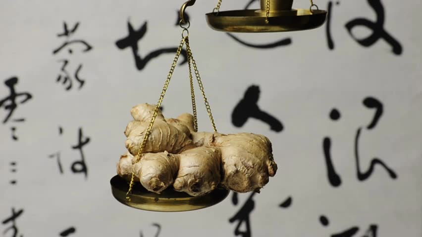 ginger root on a balance
