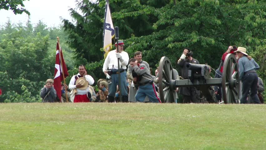 PORT GAMBLE, WA - JUN 20 -  	Rebel artillery crew fires their gun.		in a mock battle at Port Gamble WA on Jun 20, 2009.
