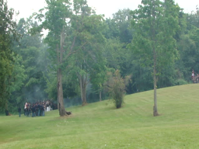 PORT GAMBLE, WA - JUN 20 -  	Union infantry line fires volleys at the enemy		 as Civil War reenactors participate in a mock battle at Port Gamble WA on Jun 20, 2009.
