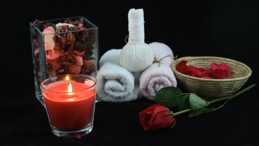 Rose candle spa, Romantic still-life with red candle and brunch rose