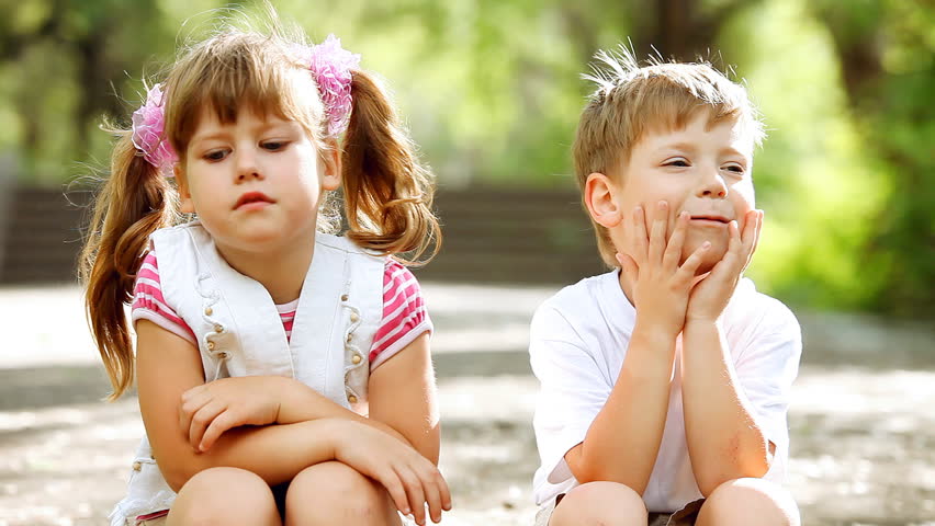 Two child funning in park, outdoors