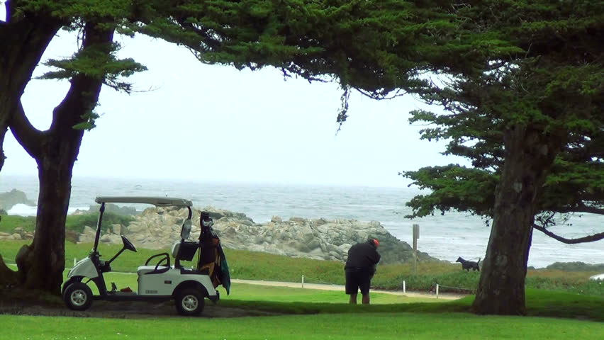 MONTEREY, CA - OCTOBER 5: Golfers at Pebble Beach golf course by the ocean, October 5, 2012 in Monterey, CA. Pebble Beach golf course is the most famous course in the Western United States,