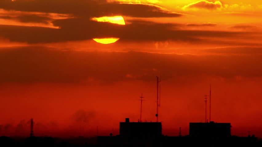 Day to Night time-lapse over the city.