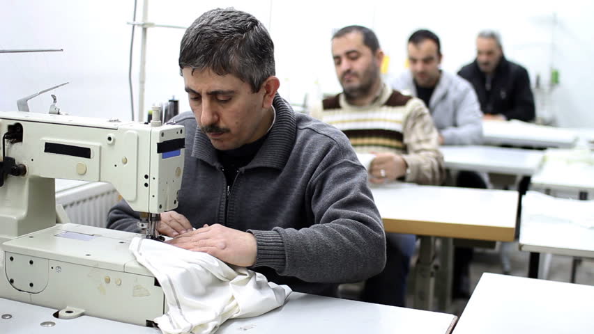 textile factory workers, closeup