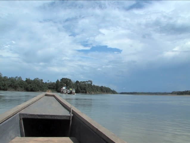 Passing a barge on the Napo River, Amazon