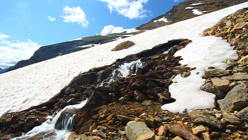 Melting snow on a late summer day in Glacier National Park