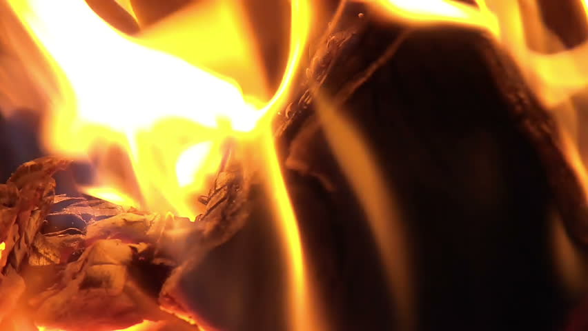 Fire with ember burning in furnace slow motion
