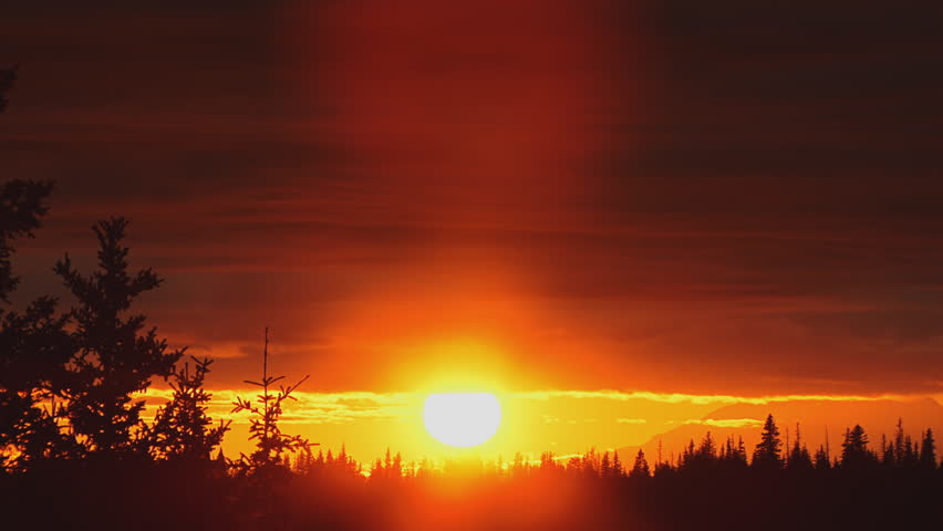 Dazzling resplendent sunset over the Cook Inlet and Mt. Redoubt.