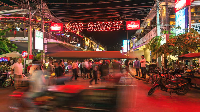 SIEM REAP, CAMBODIA-DECEMBER 9, 2012: Timelapse view of tourists walking in Siem Reap Pub Street, Angkor, Cambodia on December 8, 2012. 