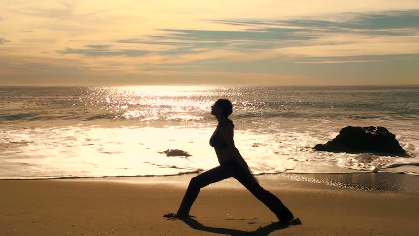 Yoga on the beach at sunset - V2 Warrior 3 HD 1080i