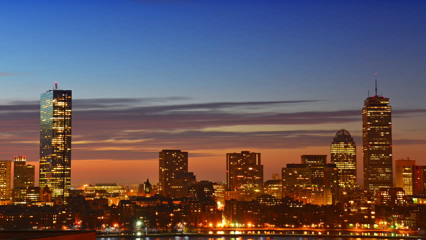 Timelapse of dramatic sunrise over Boston downtown time lapse as seen from Cambridge
