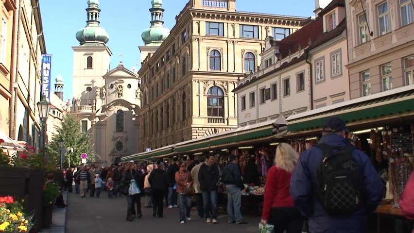 PRAGUE, CZECH REPUBLIC - CIRCA 2010: Shoppers at street market in Prague, Czech Republic