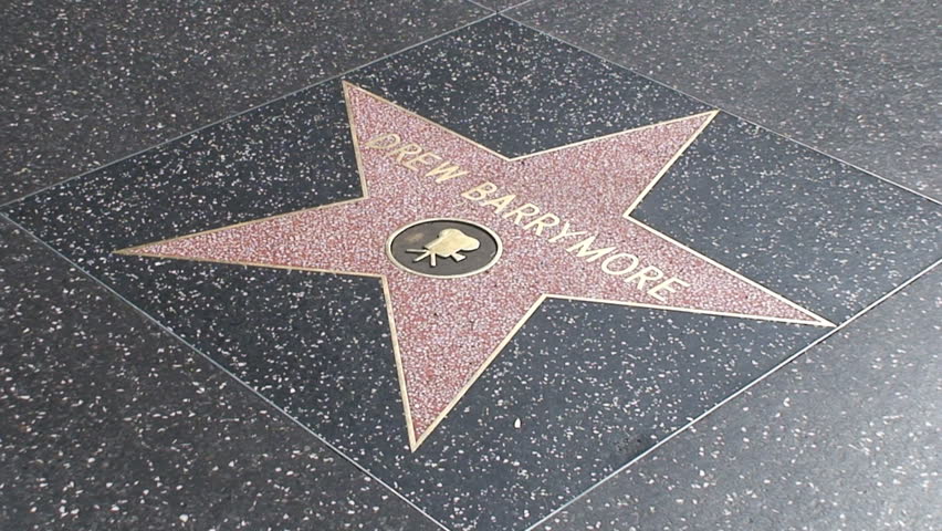 HOLLYWOOD, LOS ANGELES - CIRCA 2009: Tourists walking on Hollywood Walk of Fame in Hollywood, California. 