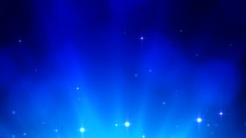 Rotating shinning light streaks up with light particles
