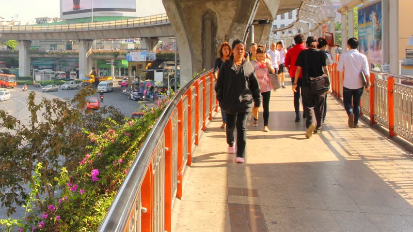 BANGKOK - JAN 9: Time lapse of morning commuters at the Victory Monument on January 9, 2013 in Bangkok, Thailand.