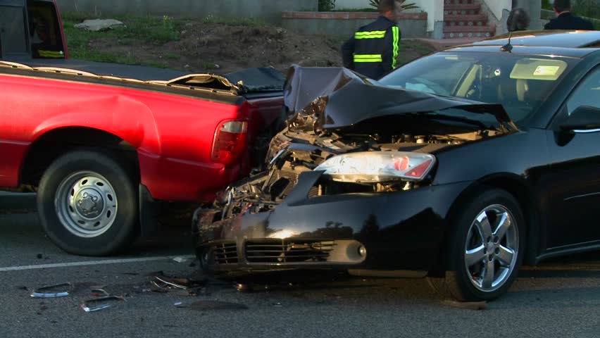 SOUTHERN CALIFORNIA, USA, 2012 Vehicles are wrecked in a car accident on a city street.