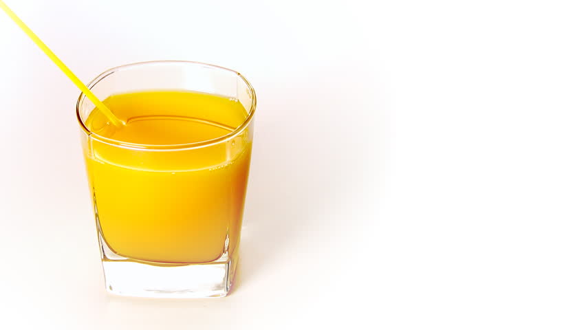 Someone is drinking orange juice through straw