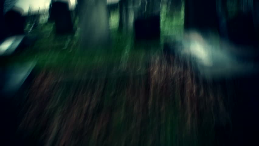Running through broken gravestones