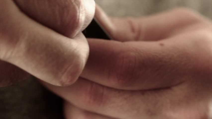 Man loading ammunition in rifle clip