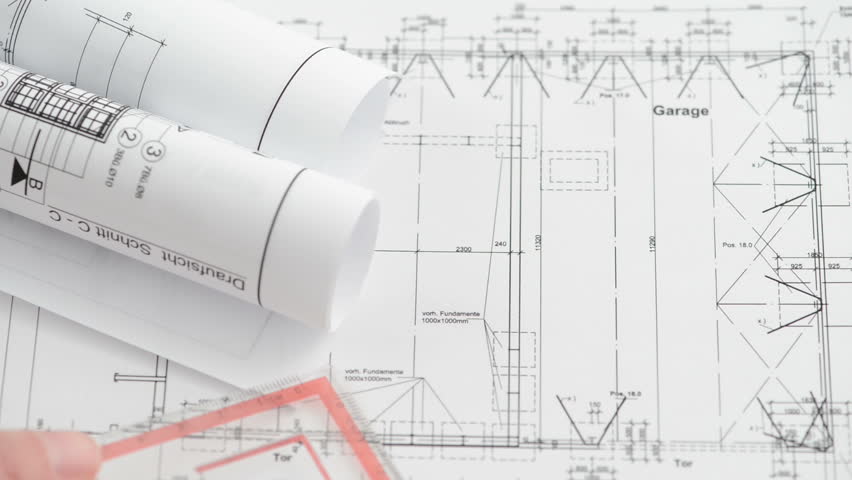 Architectural Drawing Blueprint place on an architectural drawing blueprint a triangle and a pen Architectural Drawing Blueprint place on an architectural drawing blueprint a triangle and a pen