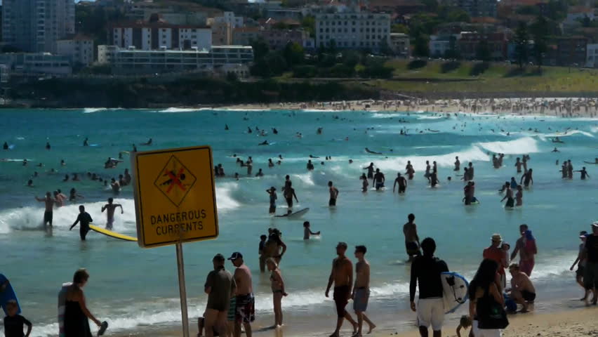 SYDNEY, AUSTRALIA - JAN 3: Swimmers enjoy the surf of Bondi Beach in Sydney, Australia on January 3, 2013.