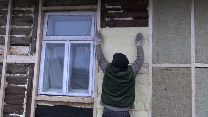 old rural house wall  insulation with mineral rock wool works