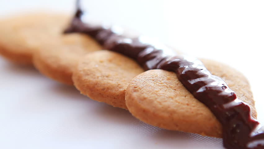 Chocolate biscuits on white table